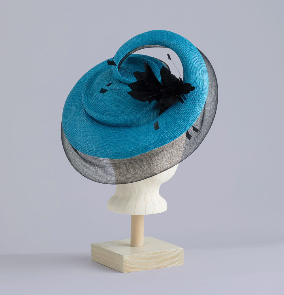 Blue Derby hatinator with black feathers