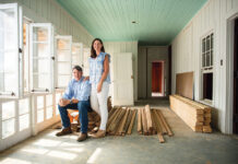 Man and woman standing at renovation site