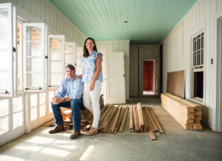 Man and woman standing at renovation site