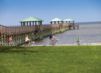 Ocean Springs: Where to Eat, Shop & Play Family biking along the beach in Ocean Springs