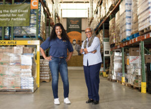 Two women working in Feeding the Gulf Coast warehouse