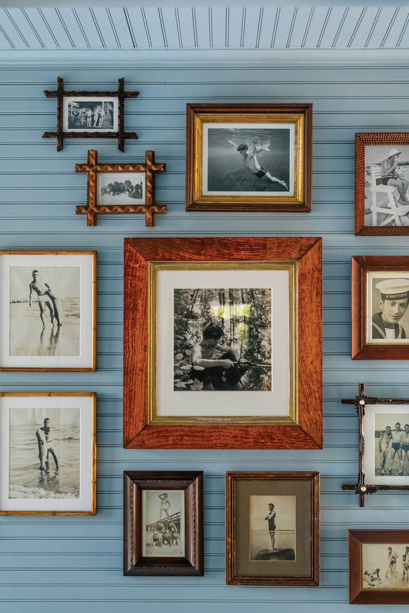 gallery wall of vintage photos at the beach 