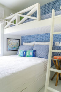beach house kids bunk room with blue and green tones