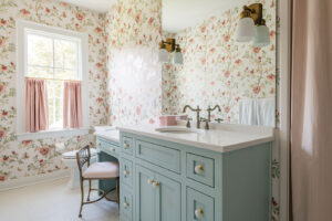 girls bathroom with pink floral wallpaper