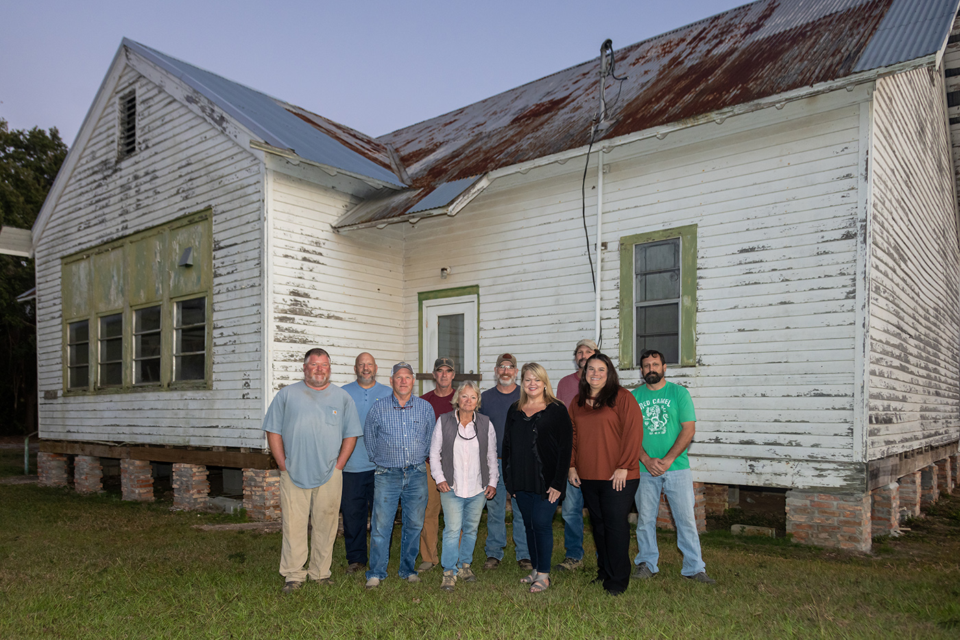 Photo of a group of volunteers working to restore the Barnwell Community Center n Baldwin County