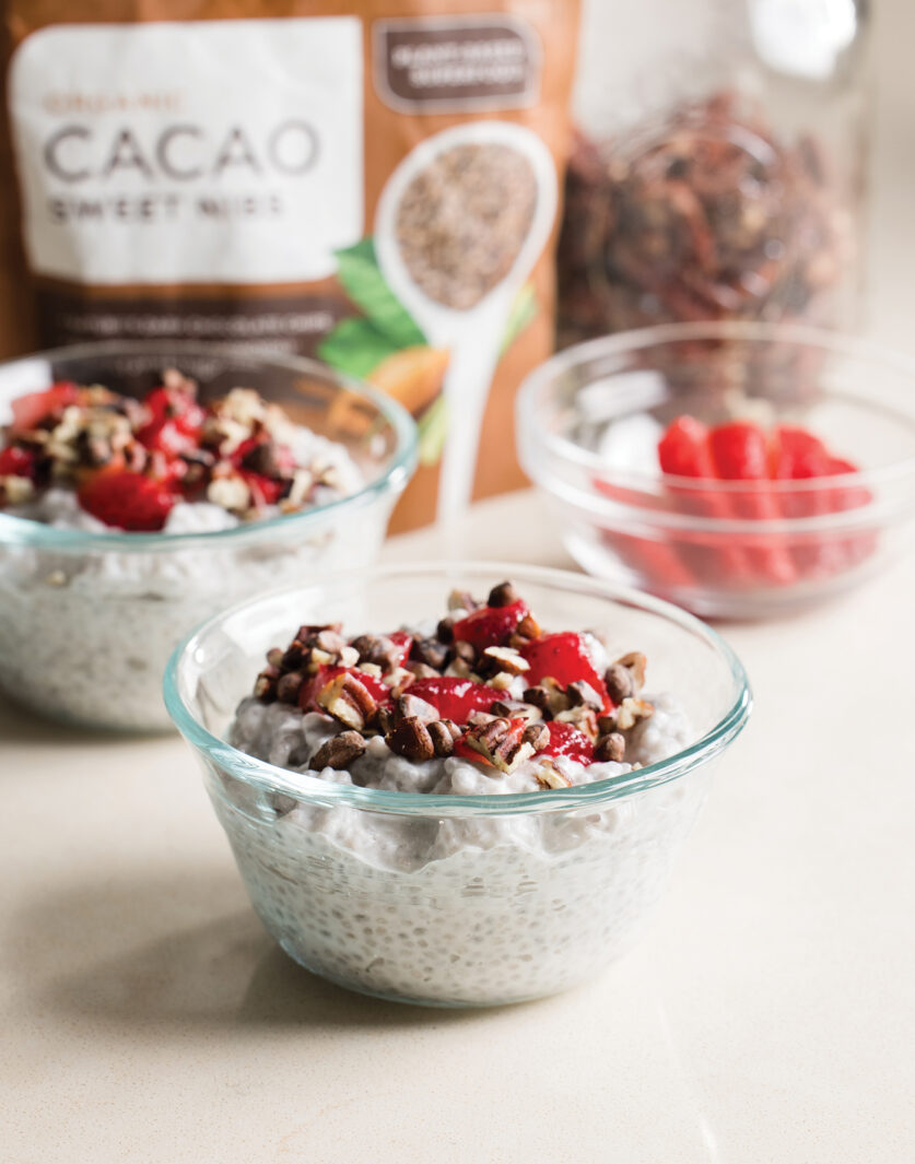 Chia Seed pudding pictured with ingredients in the background