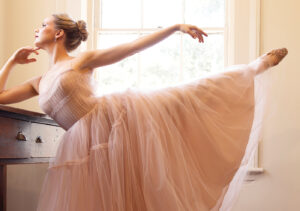 Olivia MacKinnon in her ballerina attire in a historic home