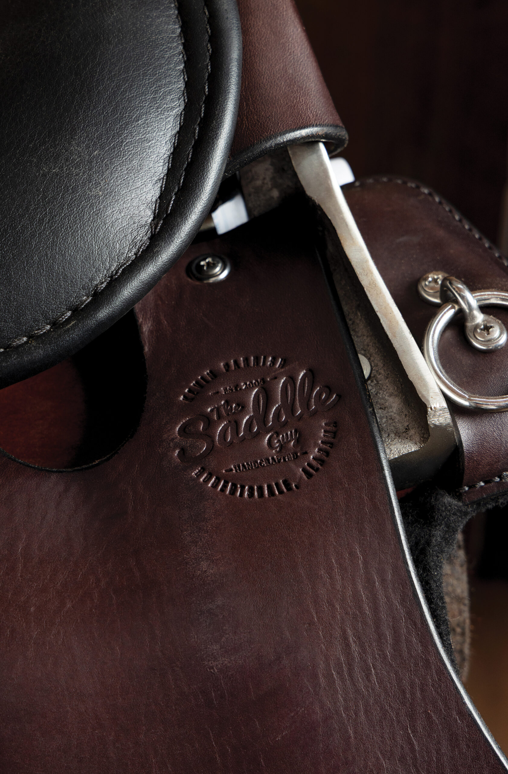 The Saddle Guy logo imprinted on a saddle
