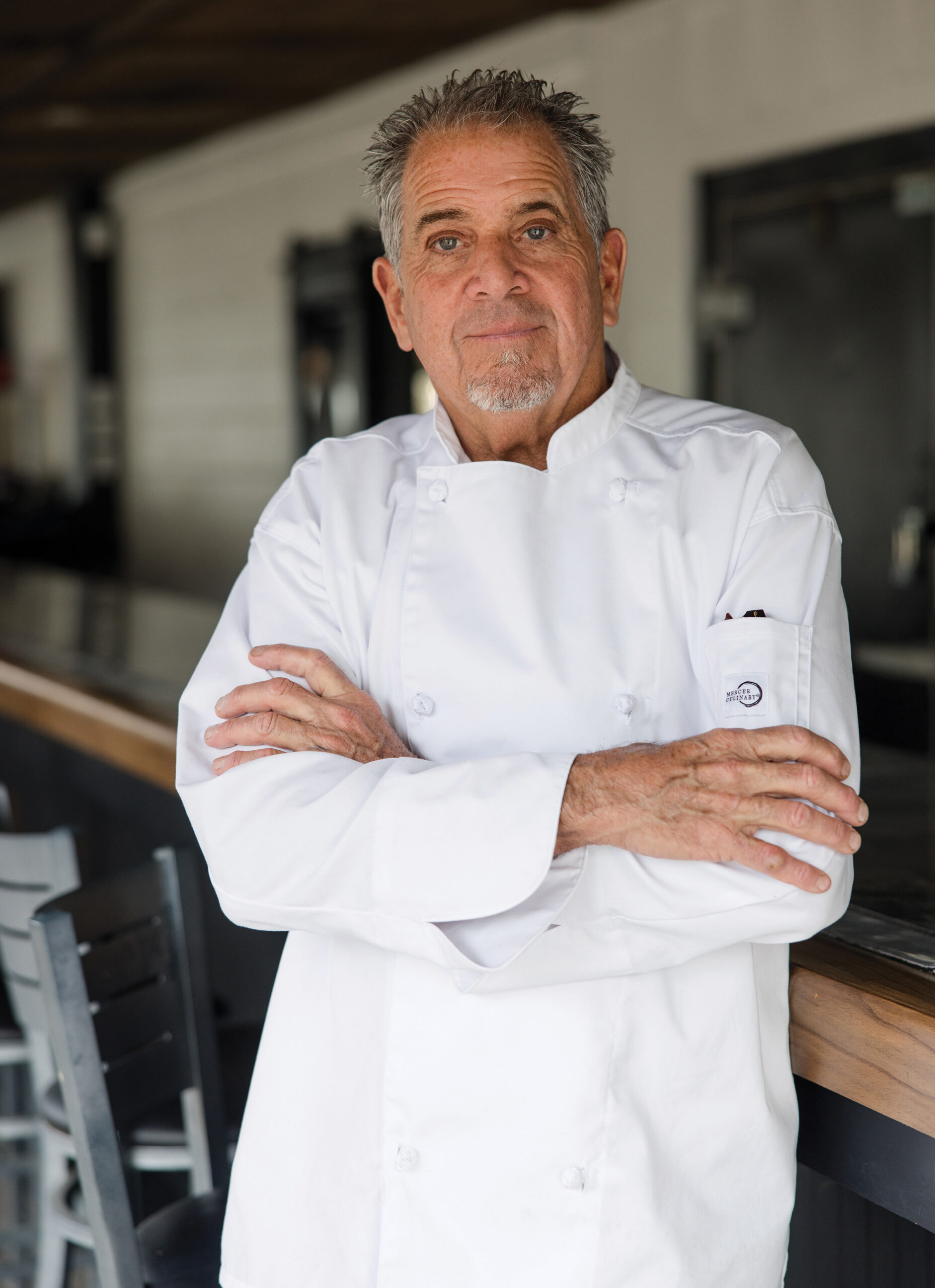 Greg Buschmohle standing outside his restaurant