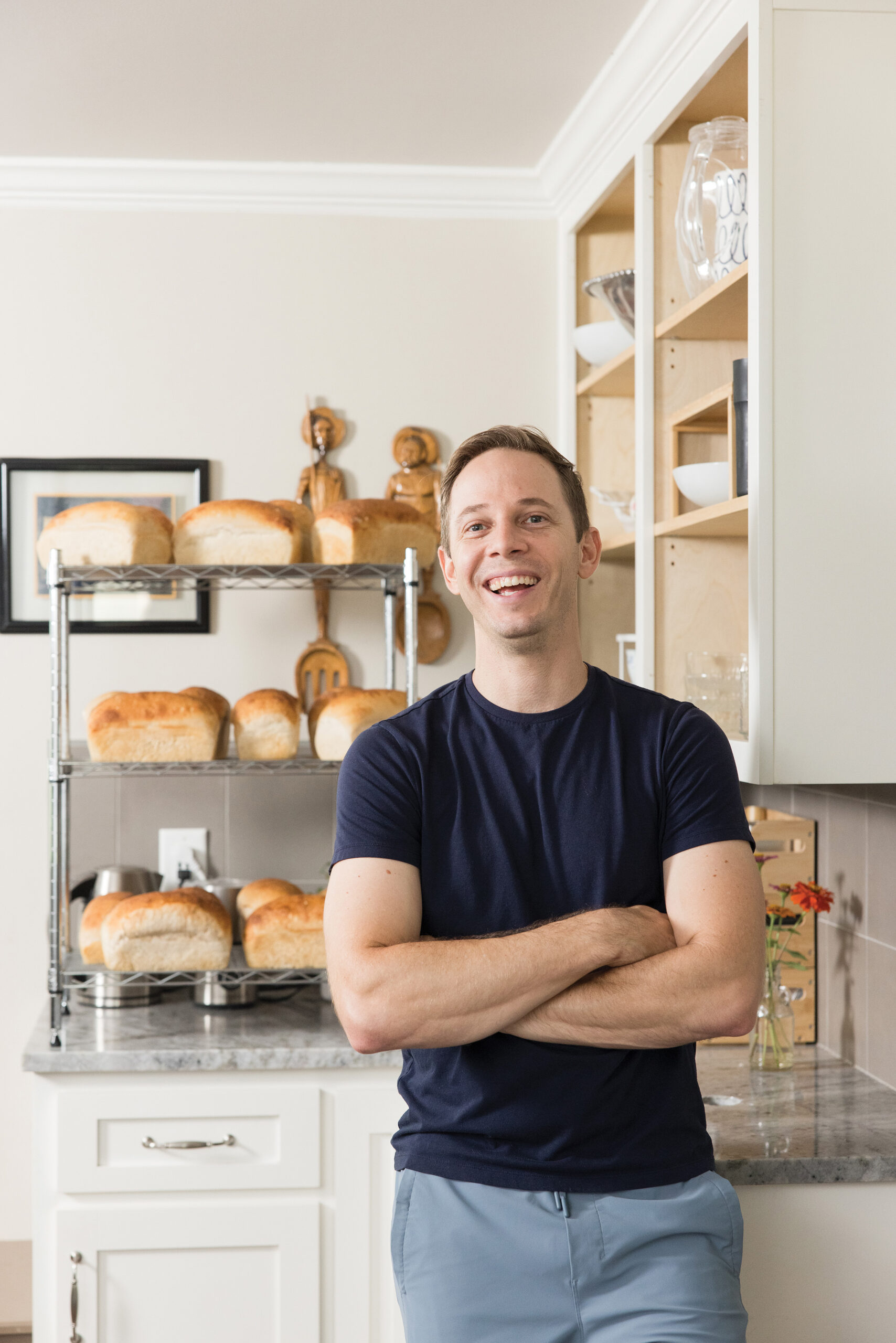 Portrait of Alex Del Rio in his home kitchen
