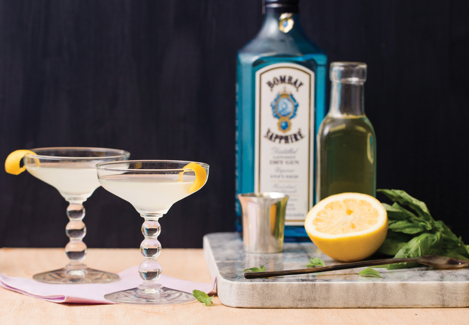 Two lemon basil gimlet cocktails